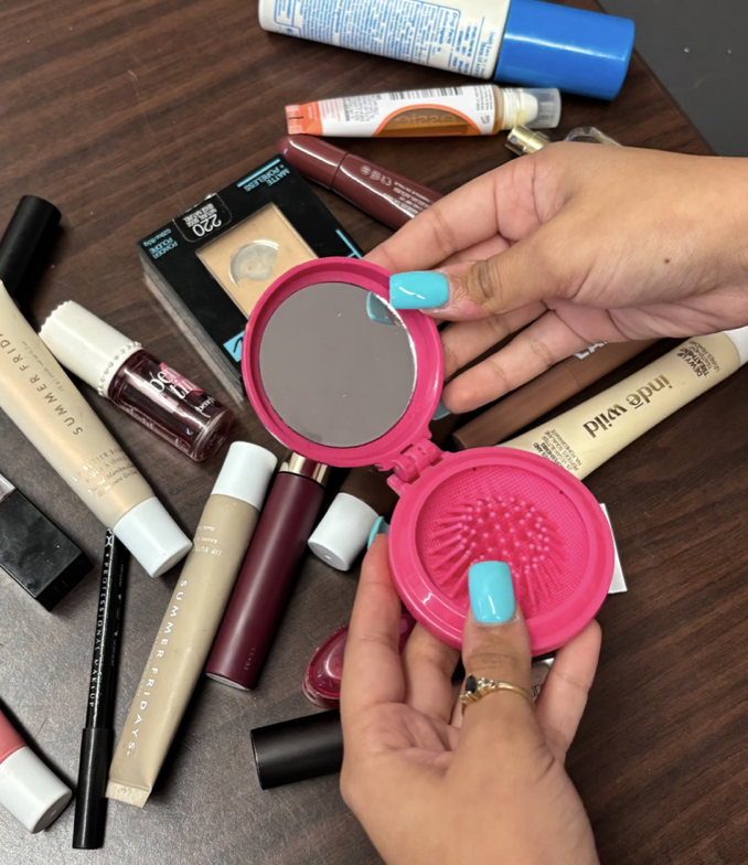 In a student's backpack, she has an array of beauty products that she uses during the school day.